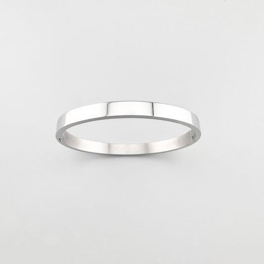 Minimalistyczna bransoletka Maravillas typu bangle o gładkiej geometrycznej formie
