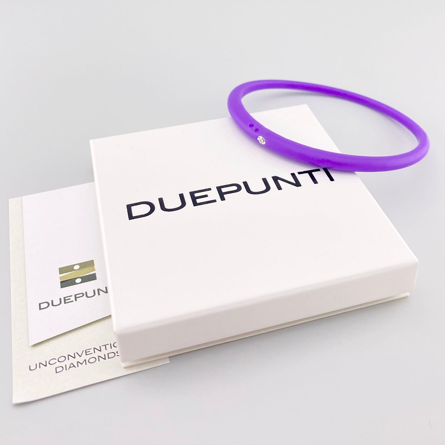 Bracelet violet Duepunti en silicone avec petit diamant et ligne épurée
