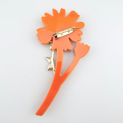 Broche fleur orange Sonata avec cristaux jaunes et fermeture au dos