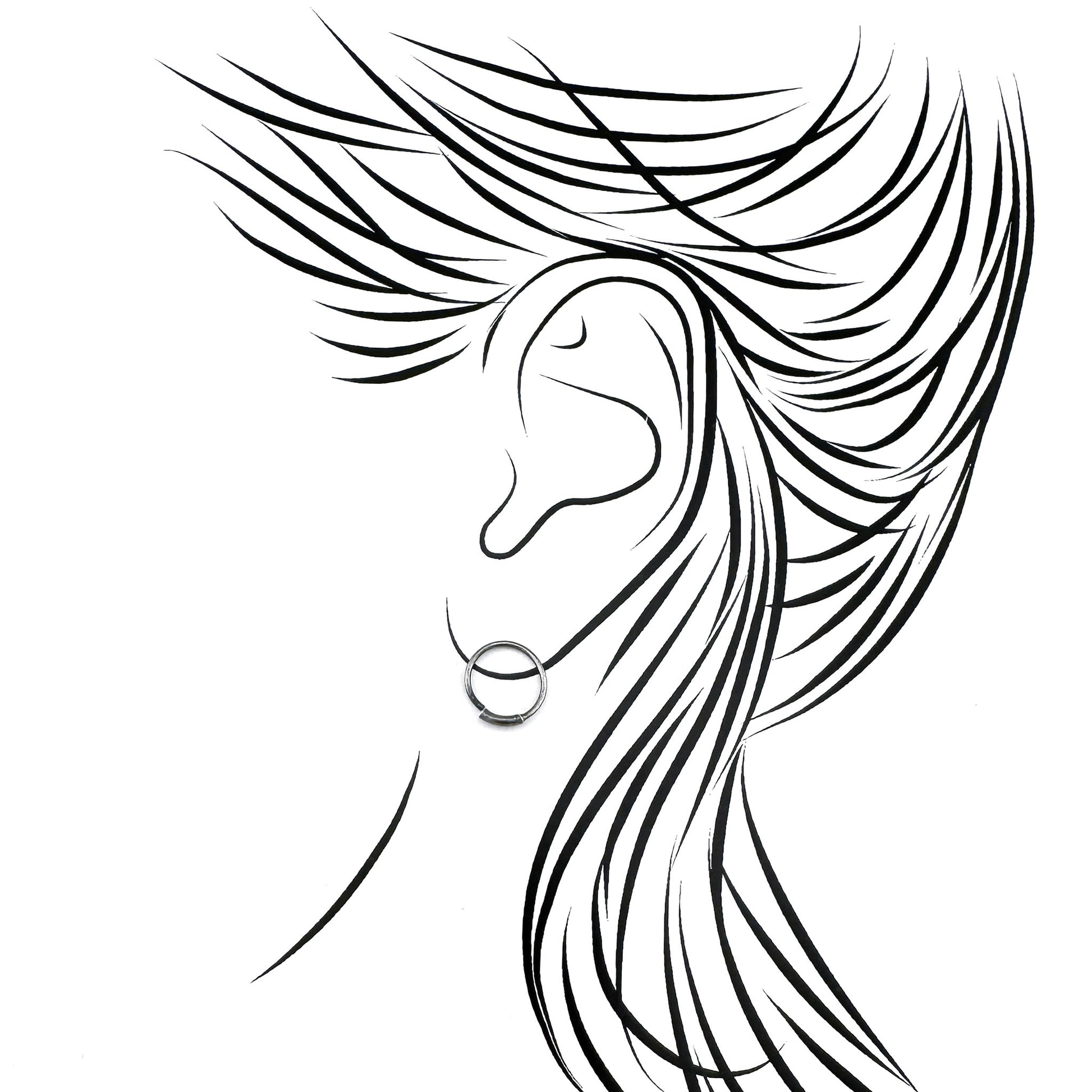 Oxidized 925 silver hoop earrings, smooth curves catching light, refined minimalist mood