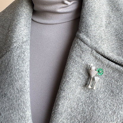 Cocktail-themed brooch with shiny zircon worn on coat as festive accent