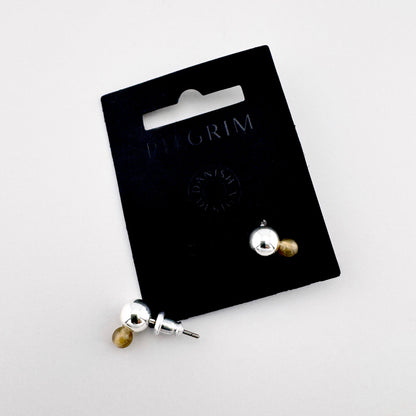 Silver and amber double-sided stud earrings on Pilgrim branded card