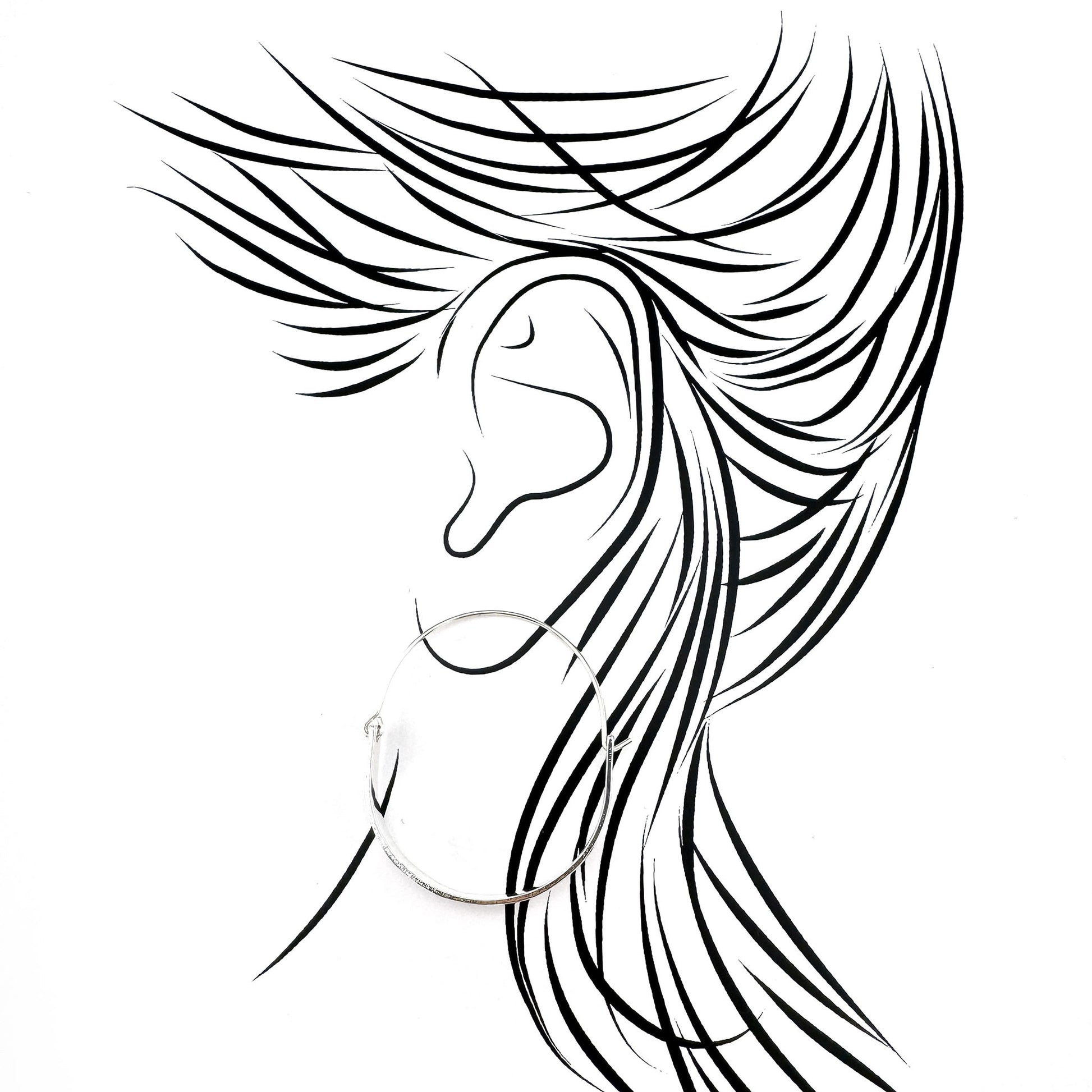 Delicate silver hoop earrings with hook clasp and sleek design