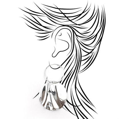 Pilgrim large disc earrings on display card, mirror polish and rippled relief catching reflections