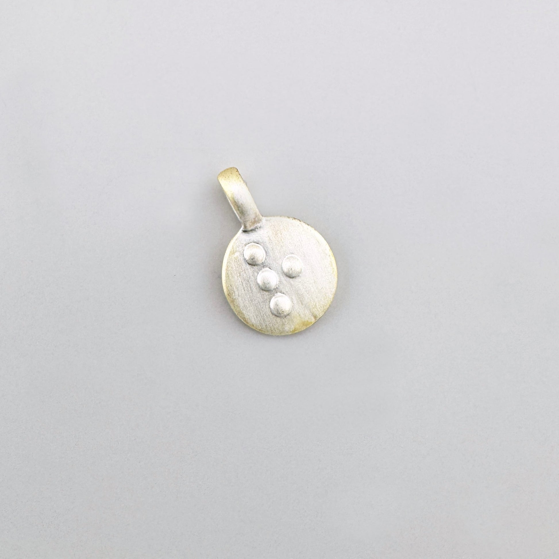 Pilgrim letter r pendant with a brushed finish and subtle engraving