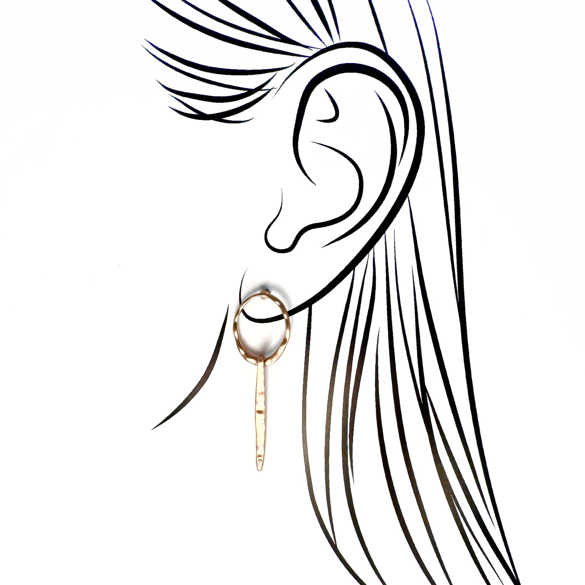 Pilgrim long hoop earrings in warm gold with subtle hammered texture and a tiny crystal tip