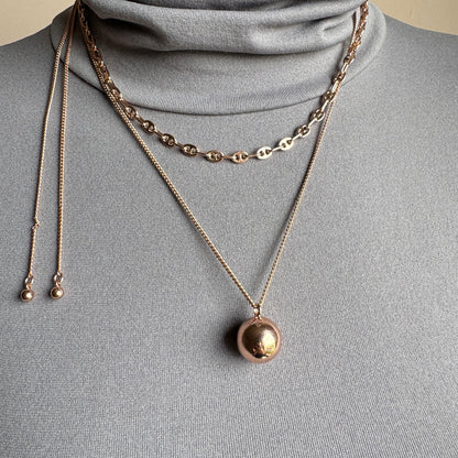 legant Pilgrim necklace set with shining sphere and chain on neckline