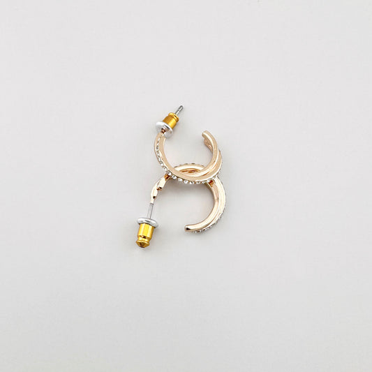 Kolczyki koła z cyrkoniami Pilgrim w ciepłym złocie, lustrzana powierzchnia i równy rząd kamieni