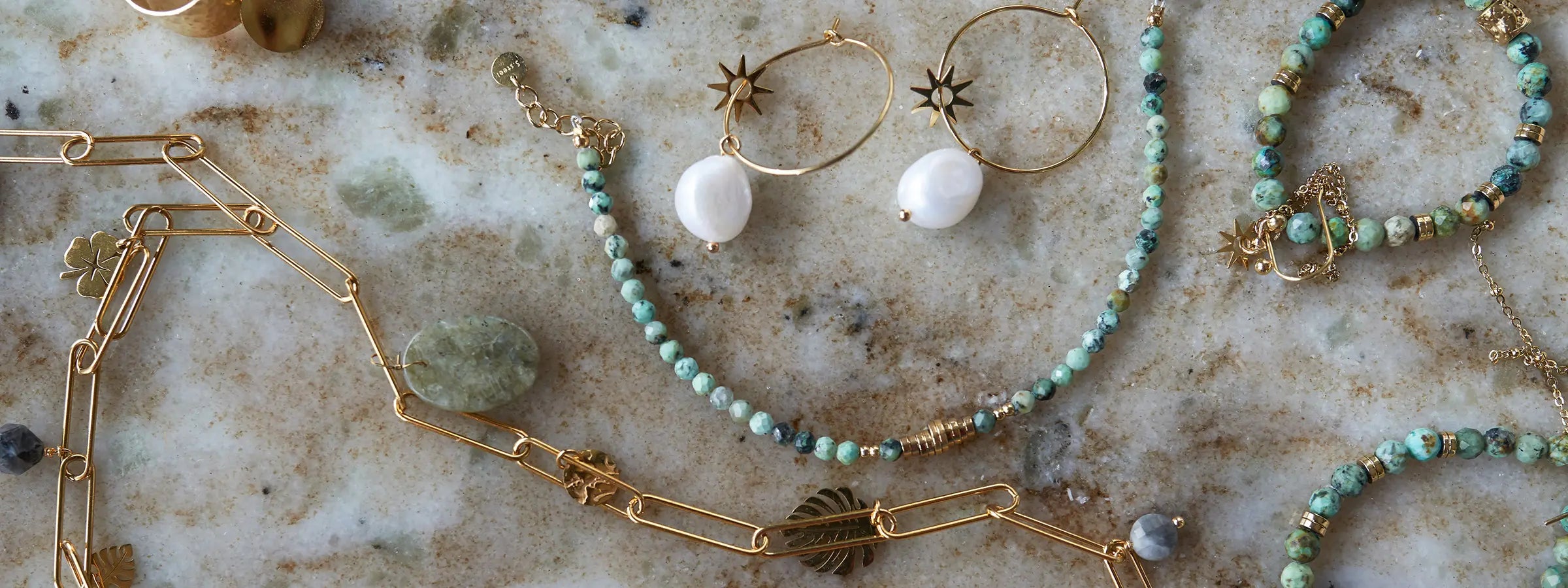 Elegant jewelry collection from Prekrasy featuring necklaces, earrings, bracelets, and rings designed for timeless beauty
