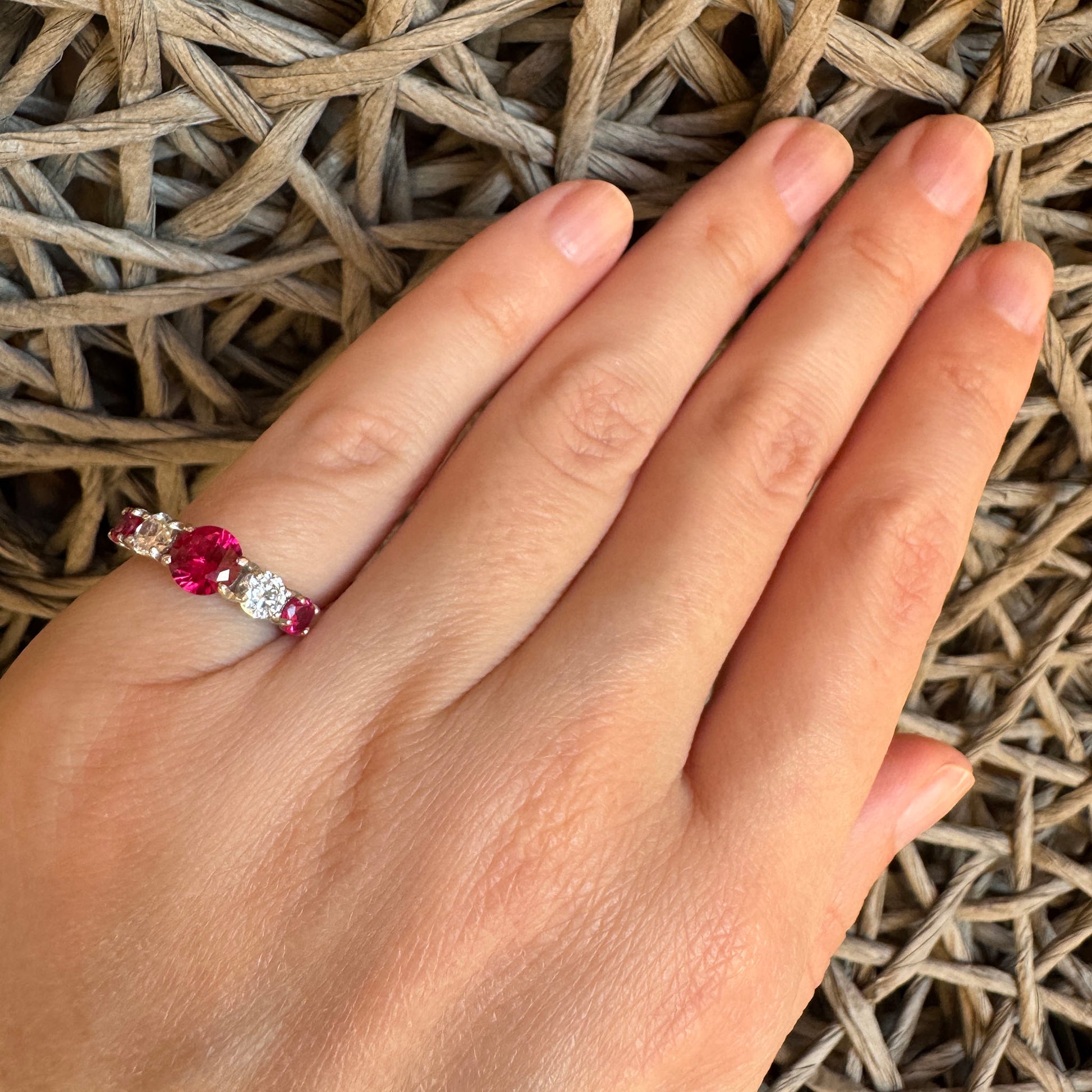 Elegant silver ring with red stone by Bliss Gioielli worn on hand