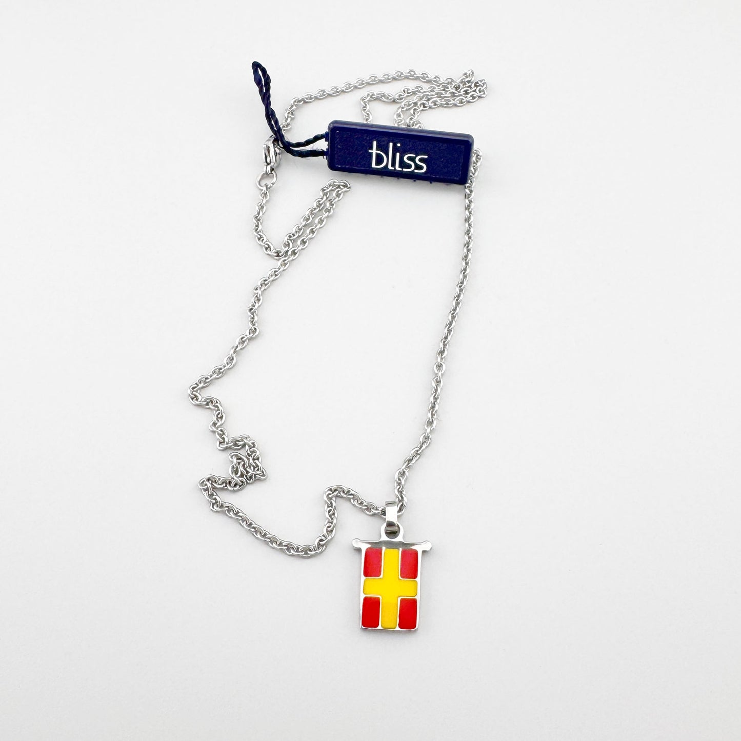Naszyjnik z emaliowaną zawieszką w czerwono-żółtych barwach, lekki łańcuszek