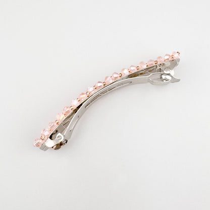 Barrette à cheveux rose avec cristaux brillants et ligne délicate