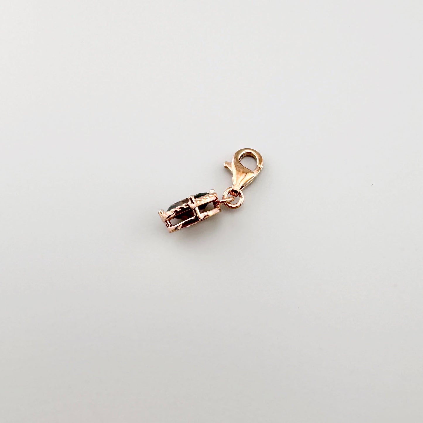 Charm Thomas Sabo con circonita ovalada y marco decorativo en tono oro rosa