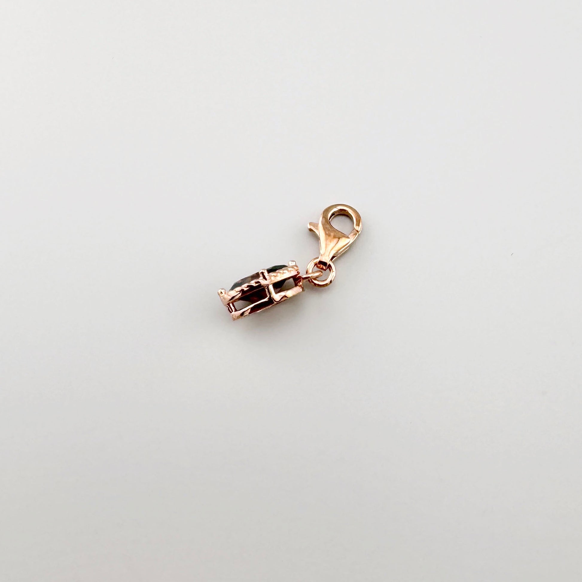 Charm Thomas Sabo con circonita ovalada y marco decorativo en tono oro rosa