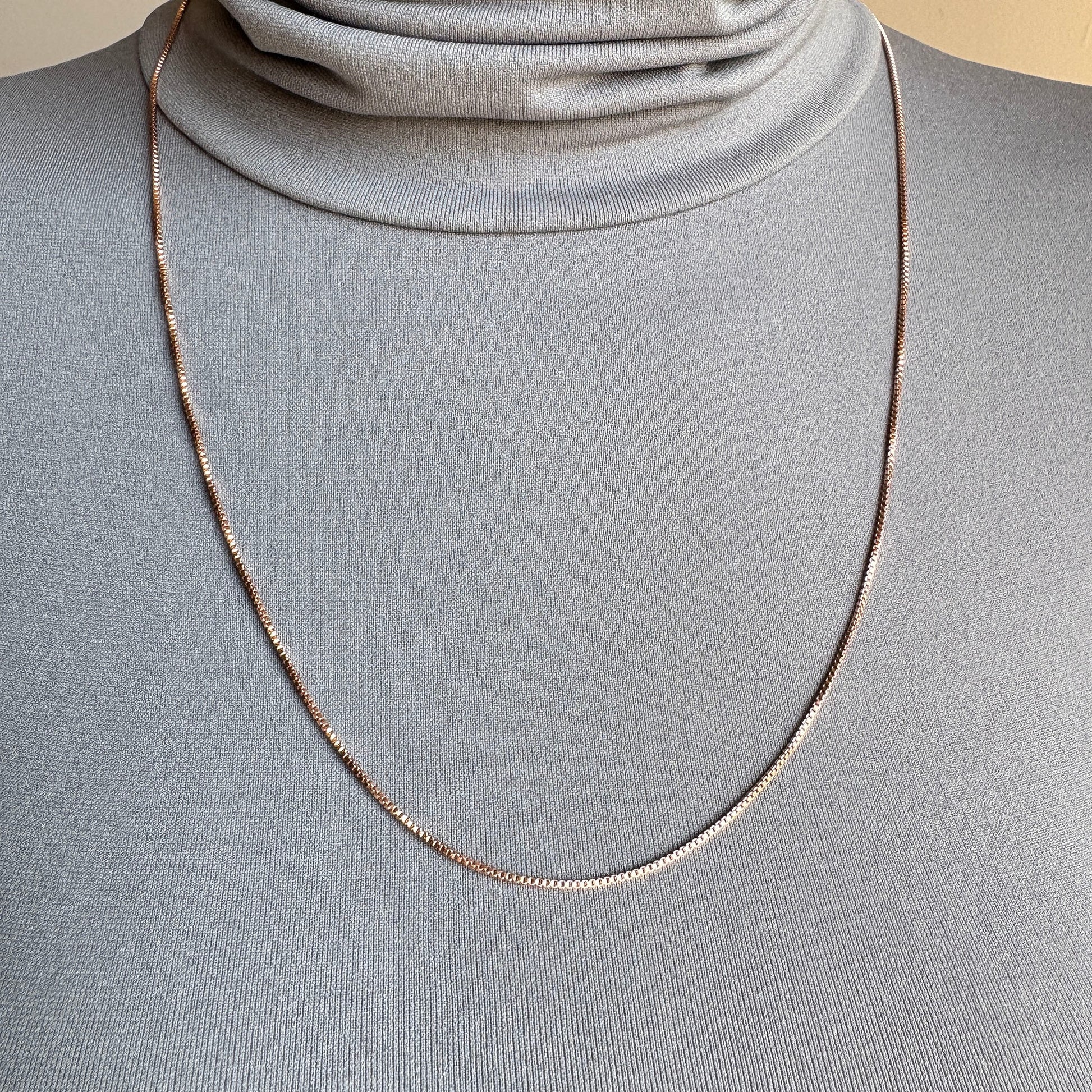 Rose gold minimalist chain Pilgrim draped softly on the neck