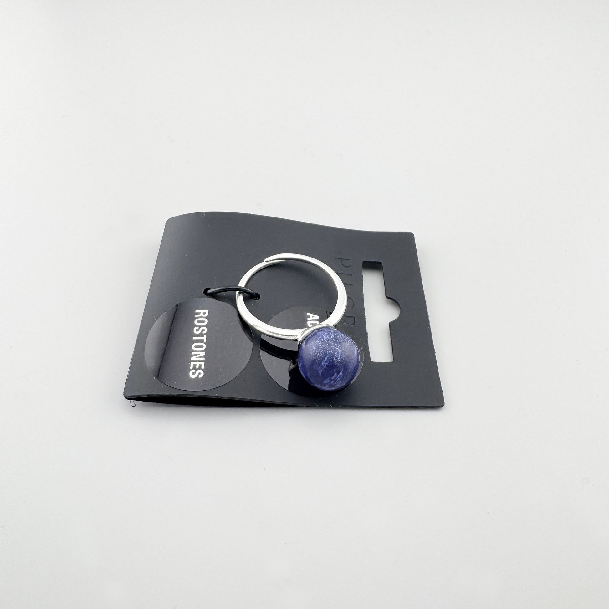 Bague Pilgrim avec boule bleu foncé et anneau ouvert argenté