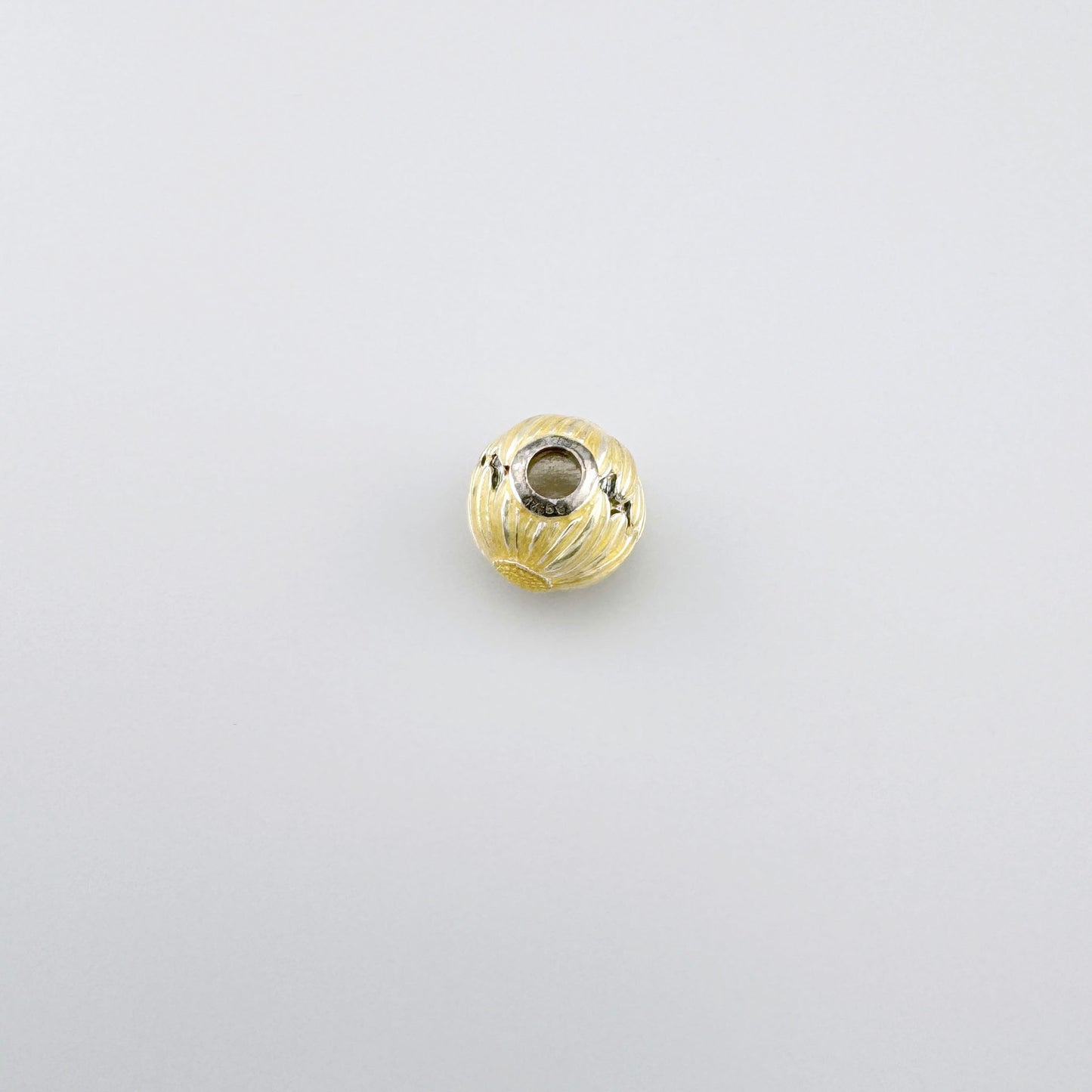 Charm sphérique Thomas Sabo avec noyau argenté visible pour bracelet modulaire