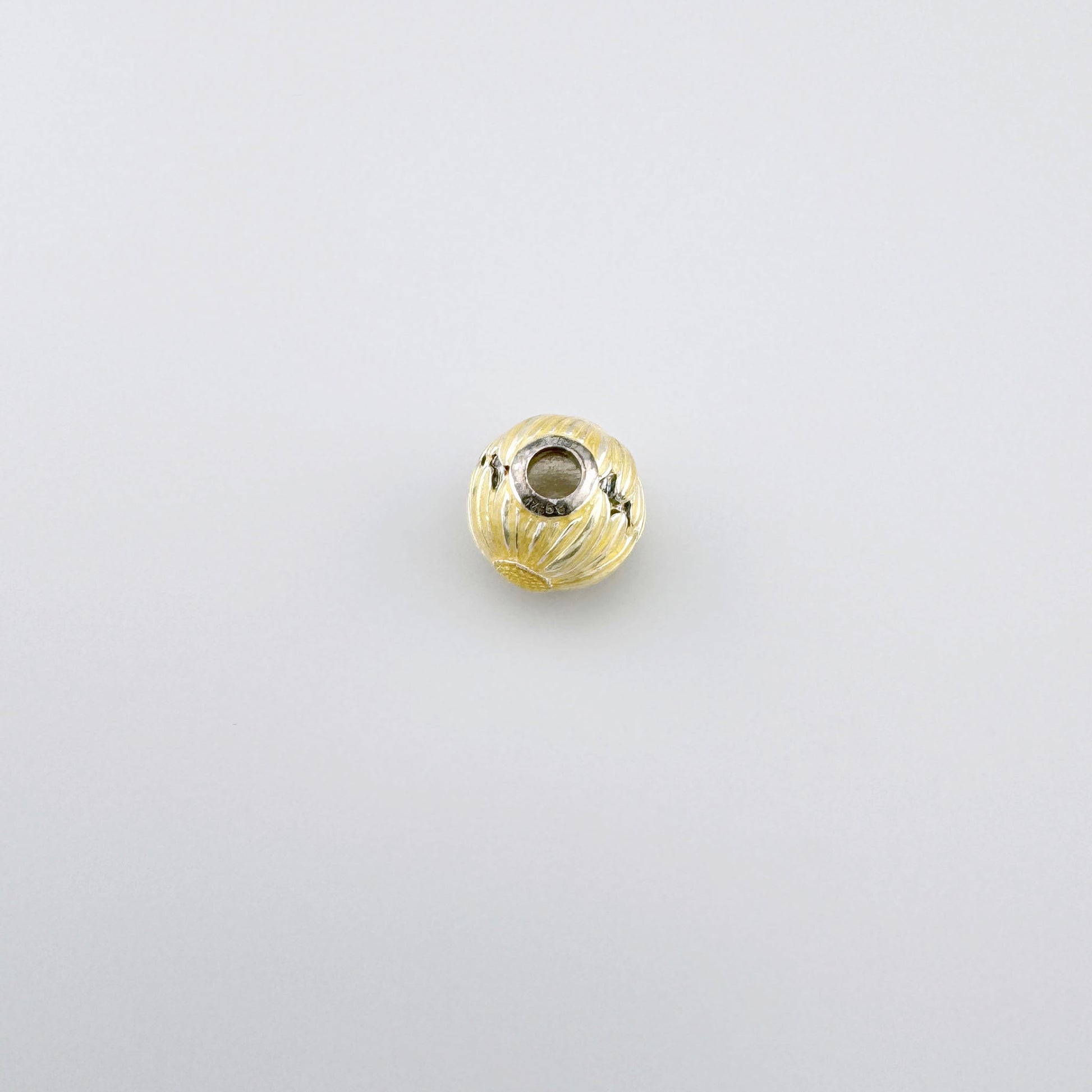 Charm sphérique Thomas Sabo avec noyau argenté visible pour bracelet modulaire