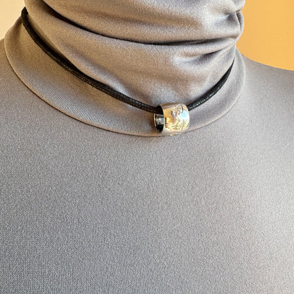 925 silver necklace on a black cord with a subtle engraved charm