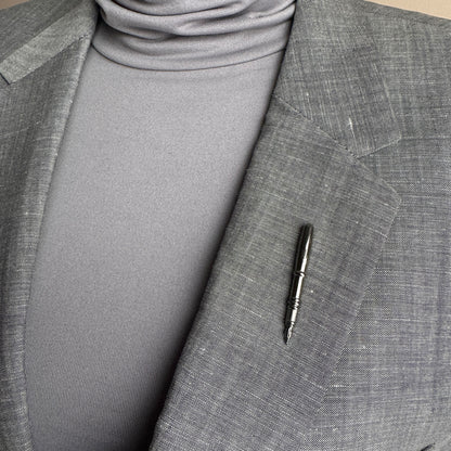 Silver fountain pen pin Sonata worn on a blazer with a polished minimalist finish