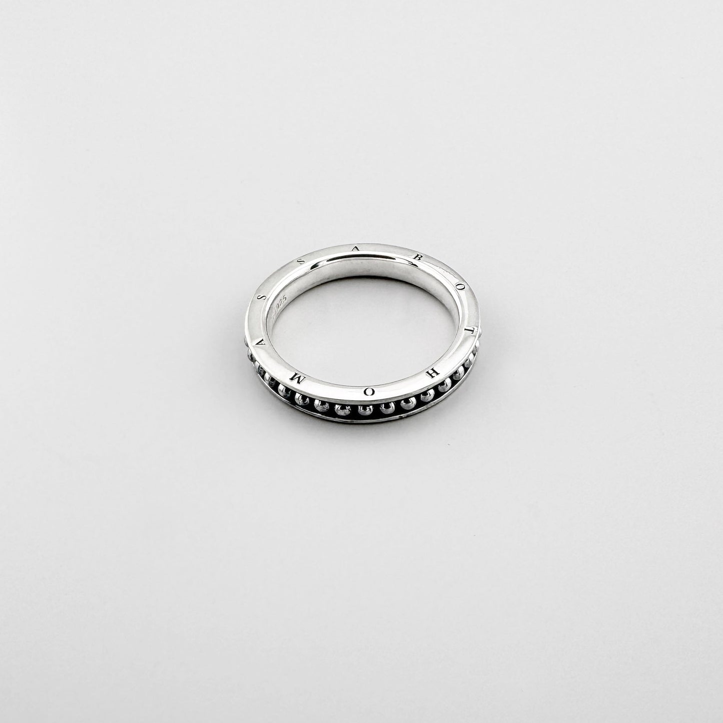 Silver Thomas Sabo band ring with engraved lettering and a delicate beaded edge