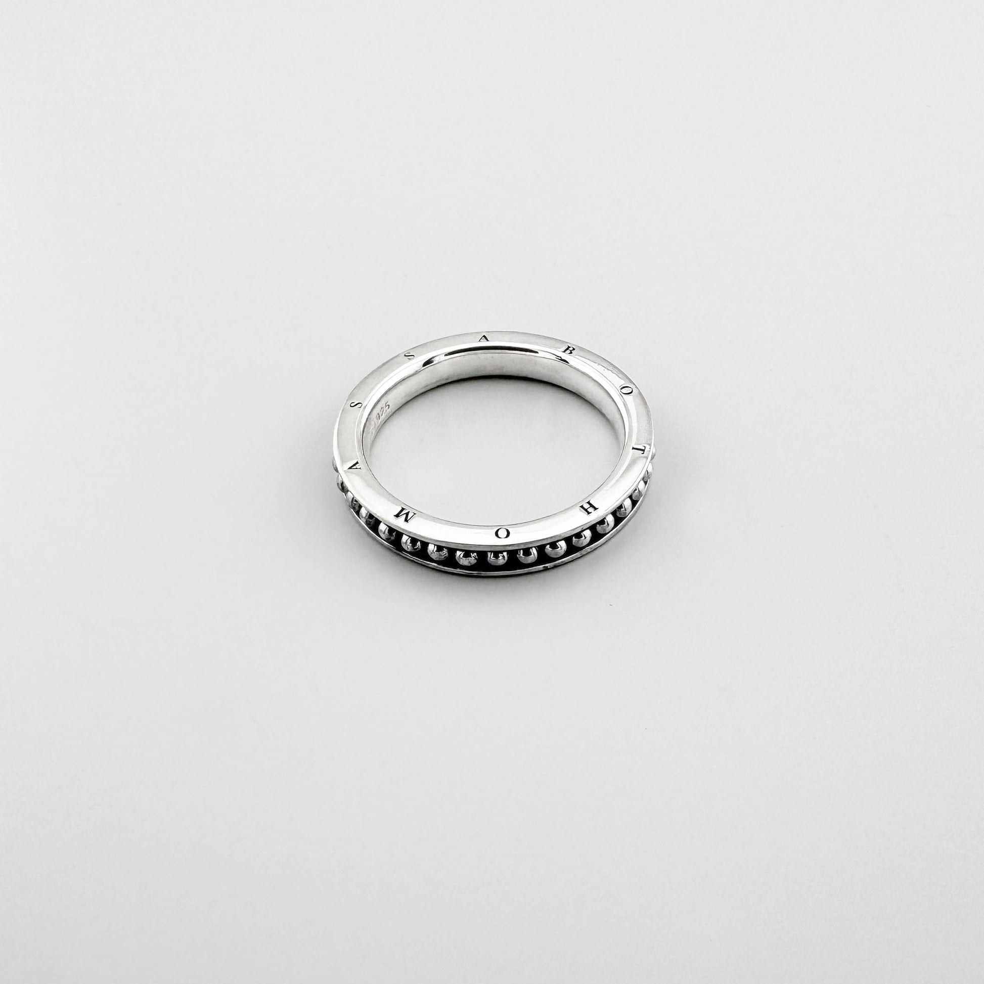 Silver Thomas Sabo band ring with engraved lettering and a delicate beaded edge