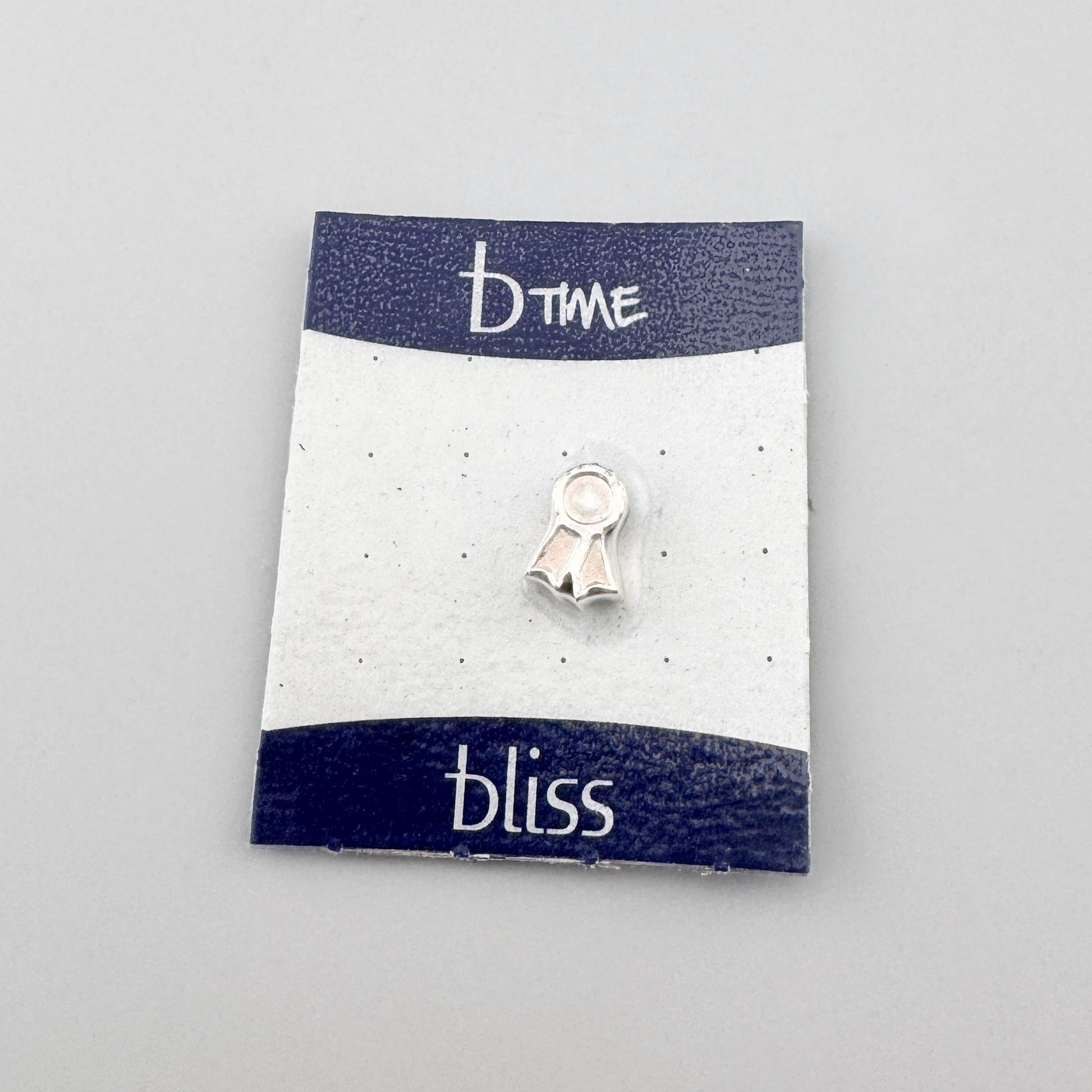 Silver mini trophy charm Bliss Gioielli displayed on a branded card