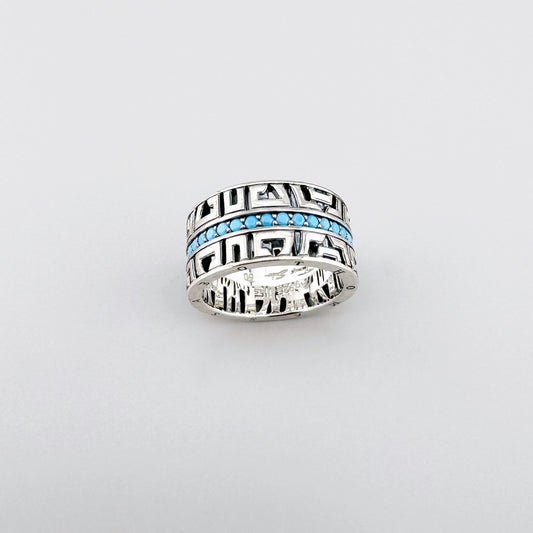 Srebrny pierścionek Thomas Sabo z turkusowym pasem i geometryczną oprawą