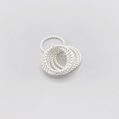 Twisted sterling silver ring by Clio blue with layered rope-textured bands