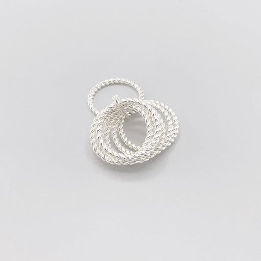 Twisted sterling silver ring by Clio blue with layered rope-textured bands