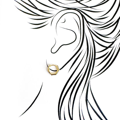 Single gold-tone hoop earring Earcandy worn on the ear with black zirconia detail