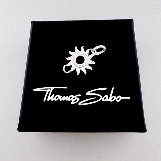 Silver sun pendant Thomas Sabo displayed with a black branded box