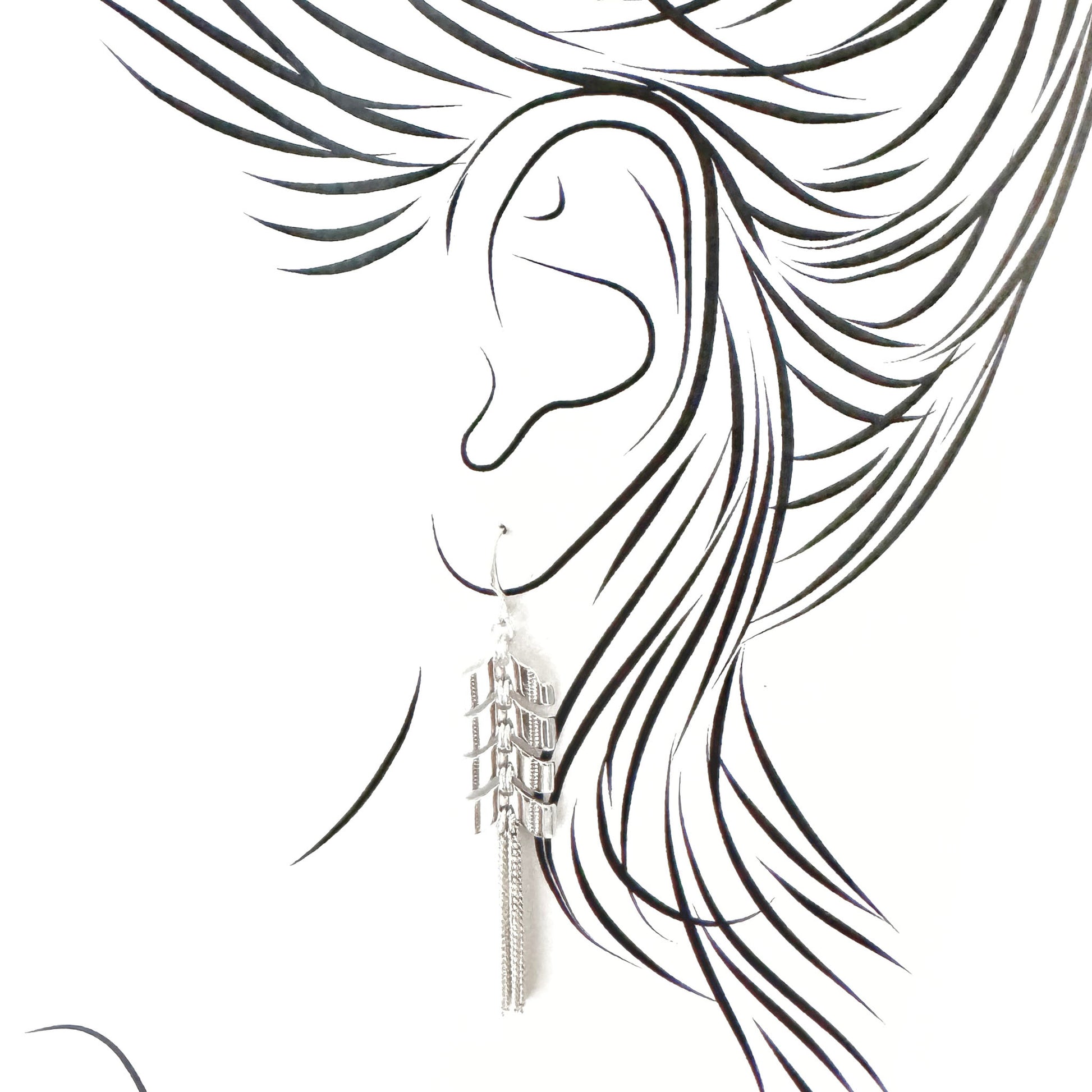 Long tassel earrings with fine chain fringes, arrow-shaped links and airy swing for easy movement