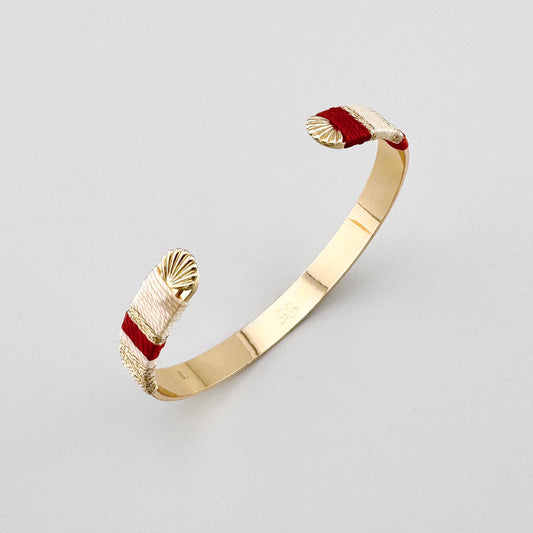 Bransoletka Sonata z oplotem nici na zlotej otwartej obraczce