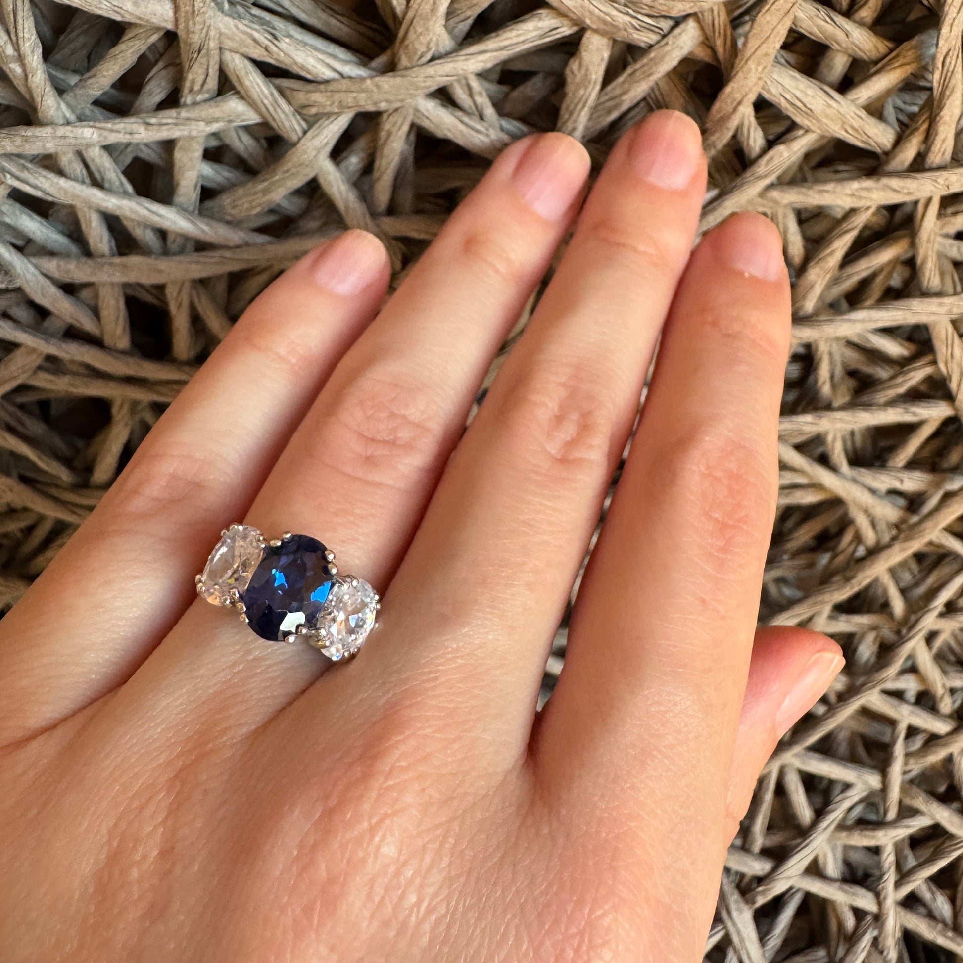 Elegant three stone silver ring by Bliss Gioielli worn on hand