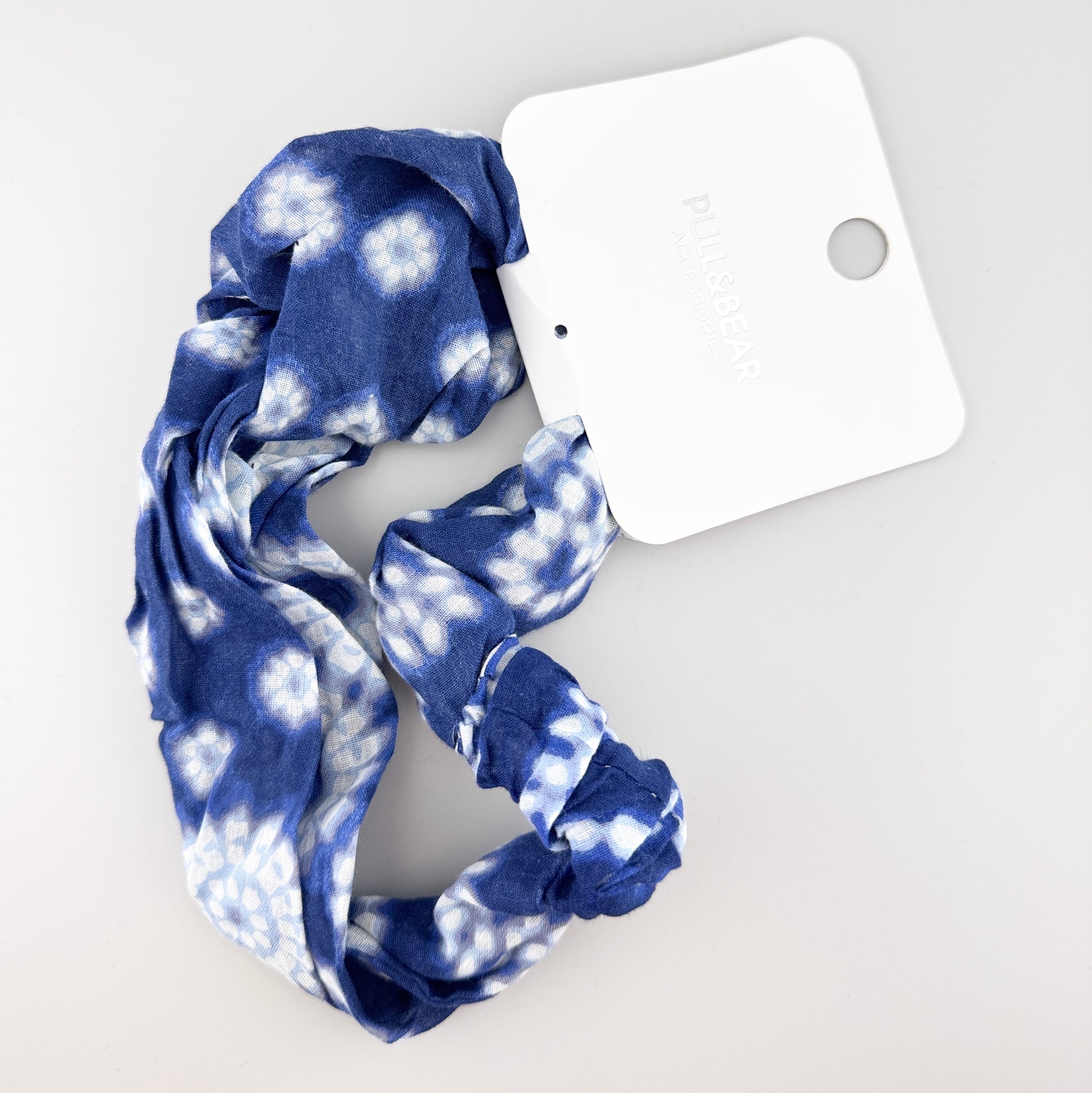 Blue tie-dye headband Pull&Bear with a soft twisted shape and elastic fit