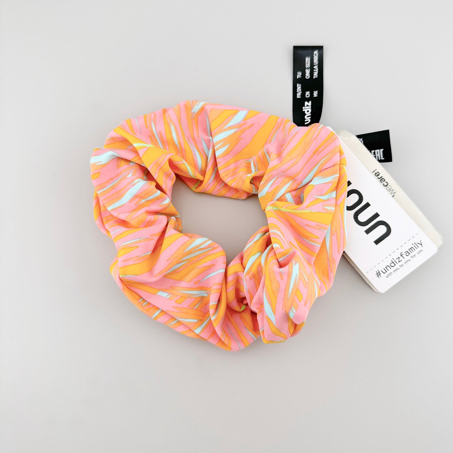 Kolorowa gumka Undiz w tropikalny wzor w rozowym i zoltym odcieniu