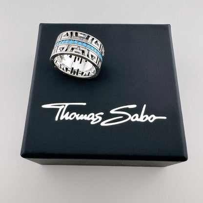 Silver turquoise ring Thomas Sabo displayed on a branded black box