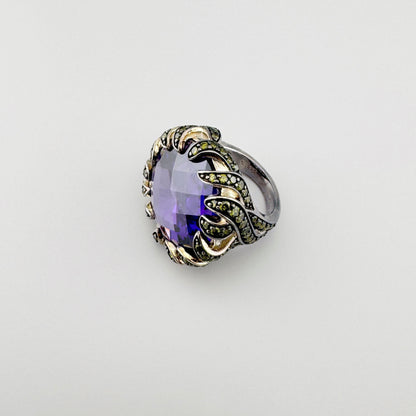 Silver Thomas Sabo ring with a large violet zirconia and sculpted side details