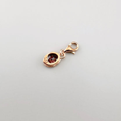 Charm Thomas Sabo avec zircone ovale et fermoir mousqueton au ton or rose