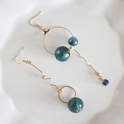 Earrings with turquoise balls