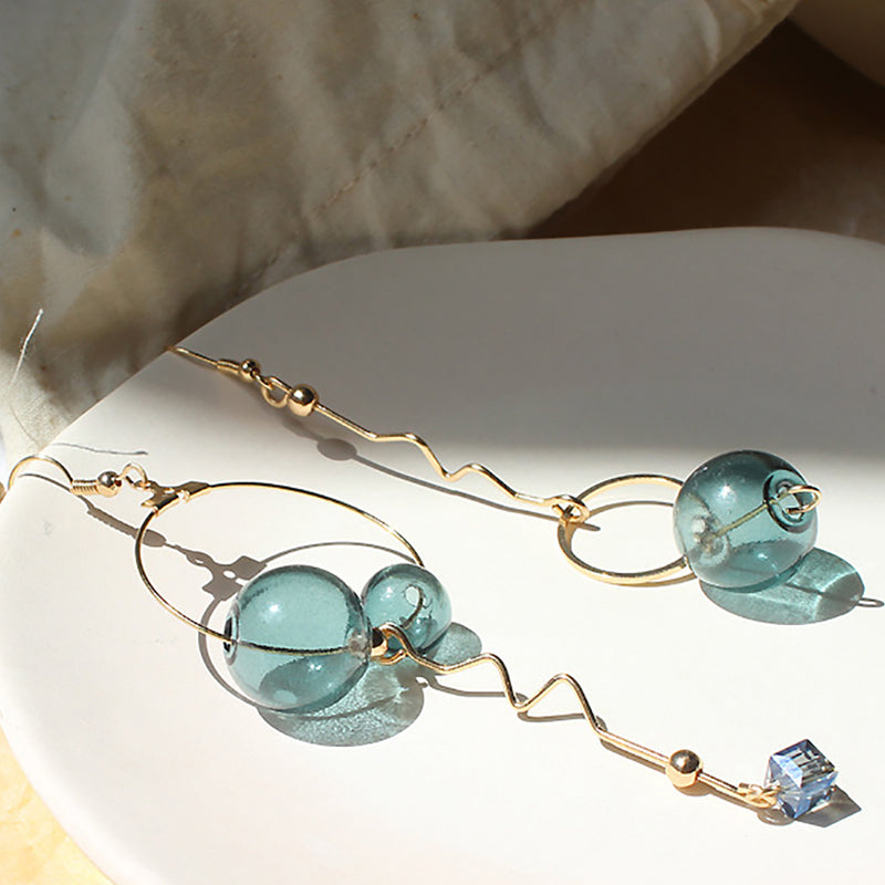 Earrings with turquoise balls