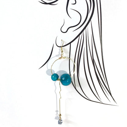 Earrings with turquoise balls