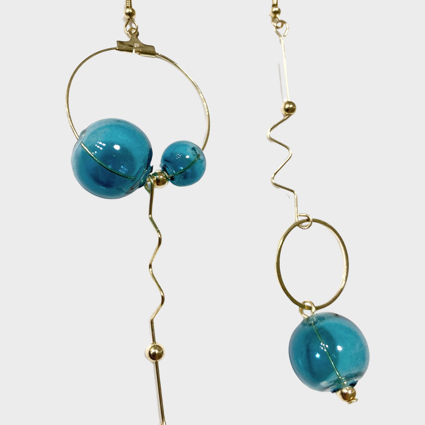 Earrings with turquoise balls