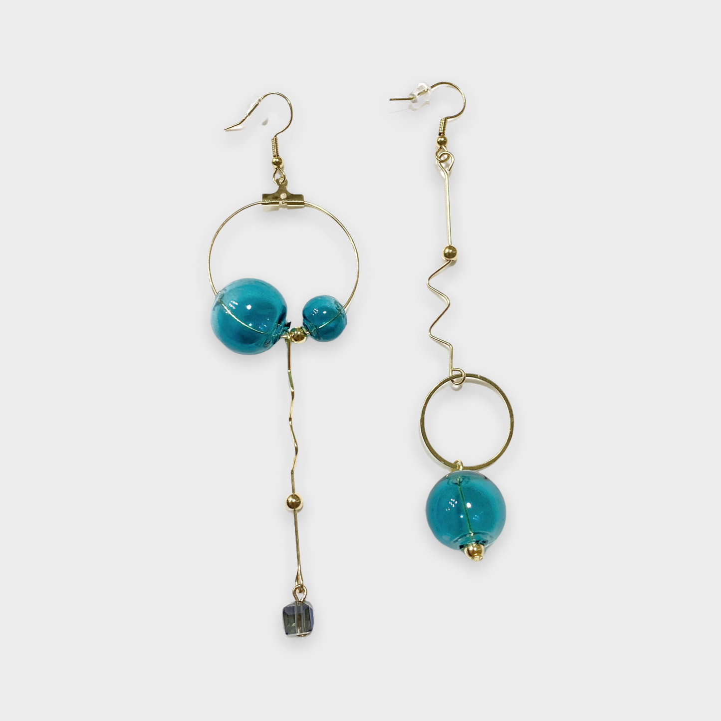 Earrings with turquoise balls