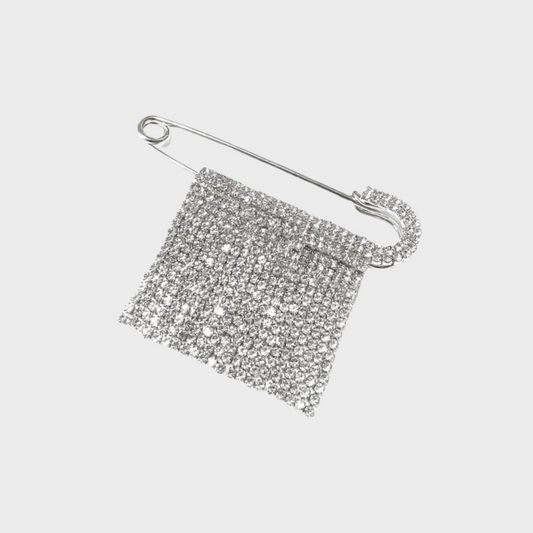 Brooch with zircons in silver colour