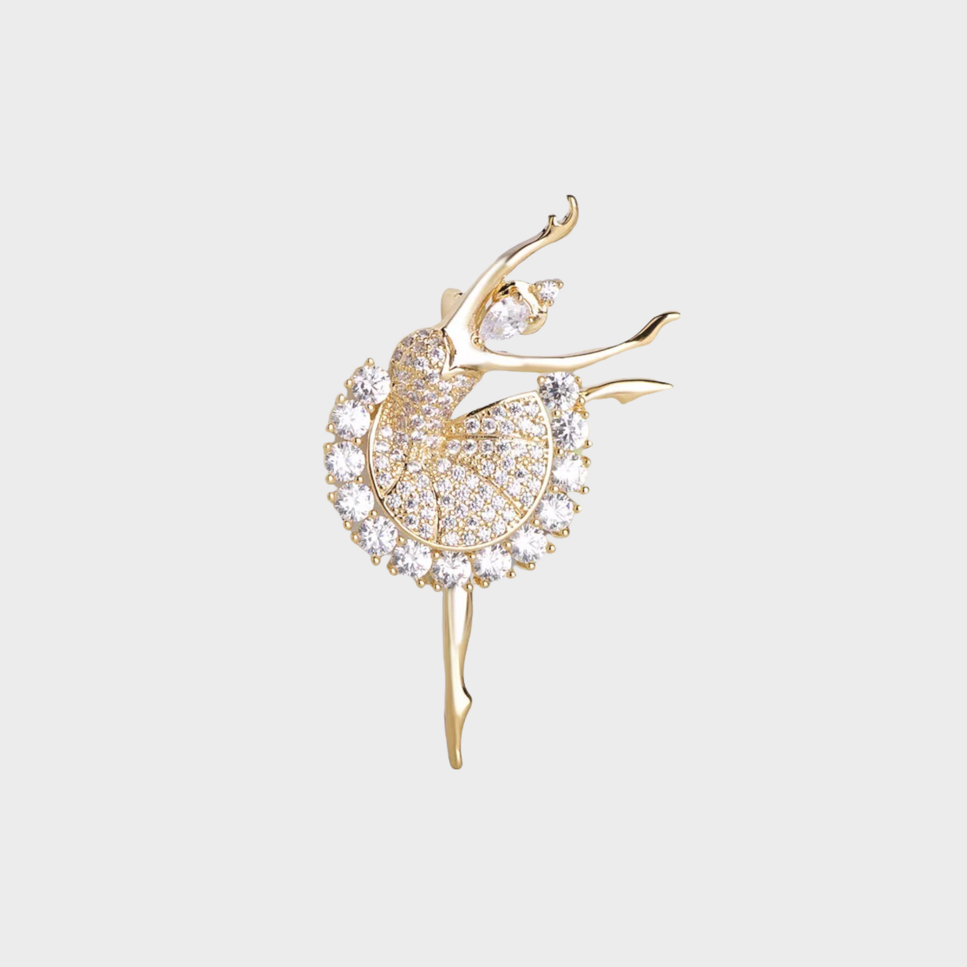 Broche dorado de bailarina con circonitas brillantes y diseño delicado