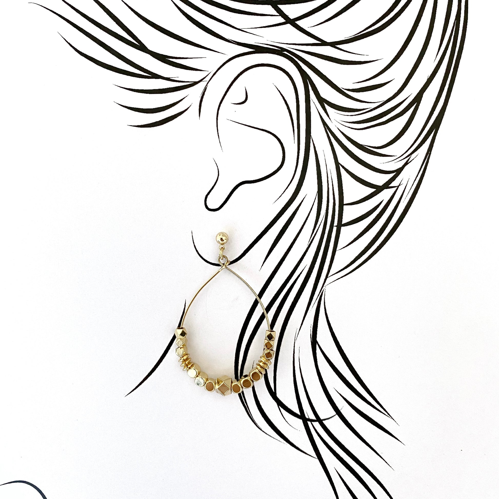 Gold drop earrings with polished faceted and smooth elements