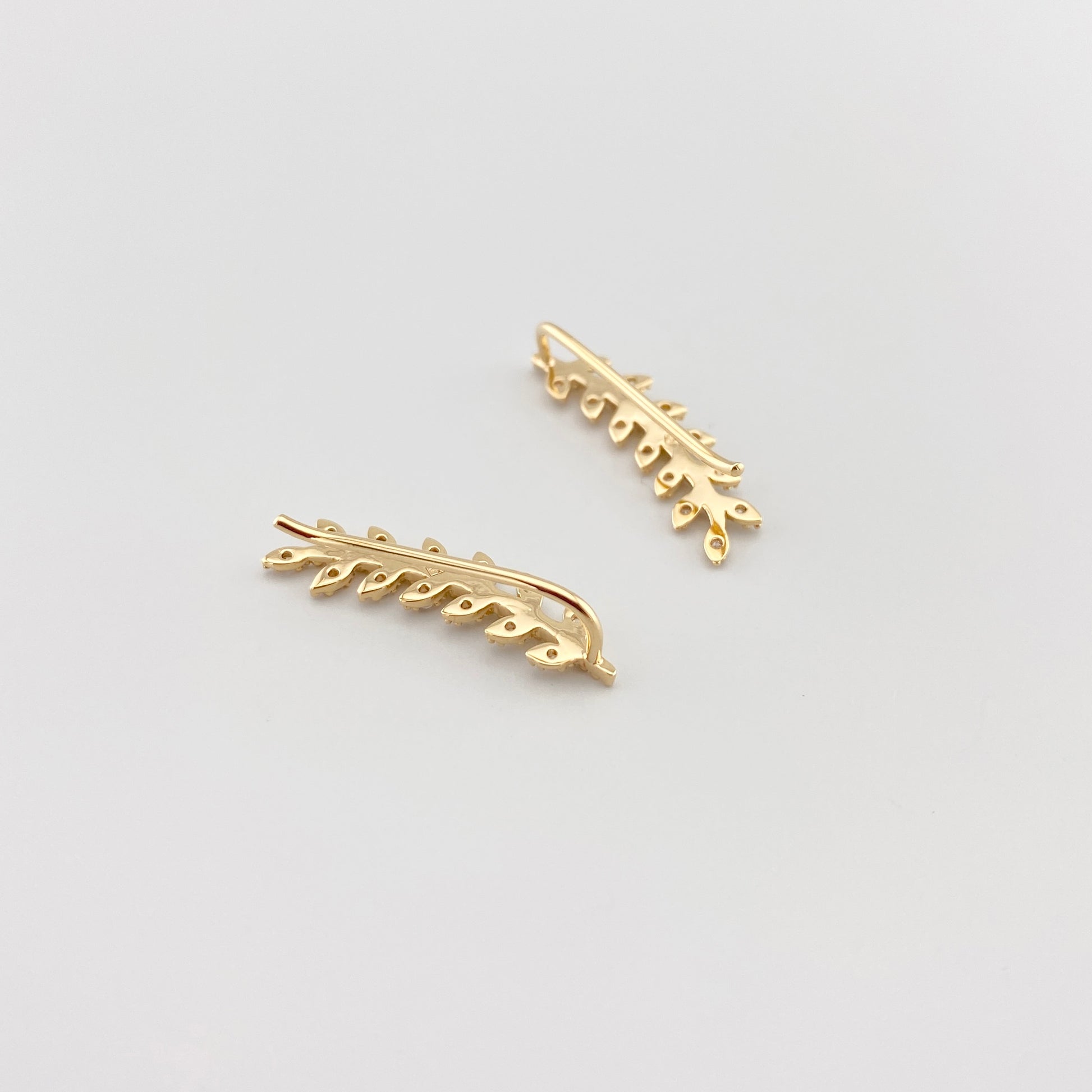 Boucles d’oreilles IRL dorées à zirconium, motif branche léger, très élégant