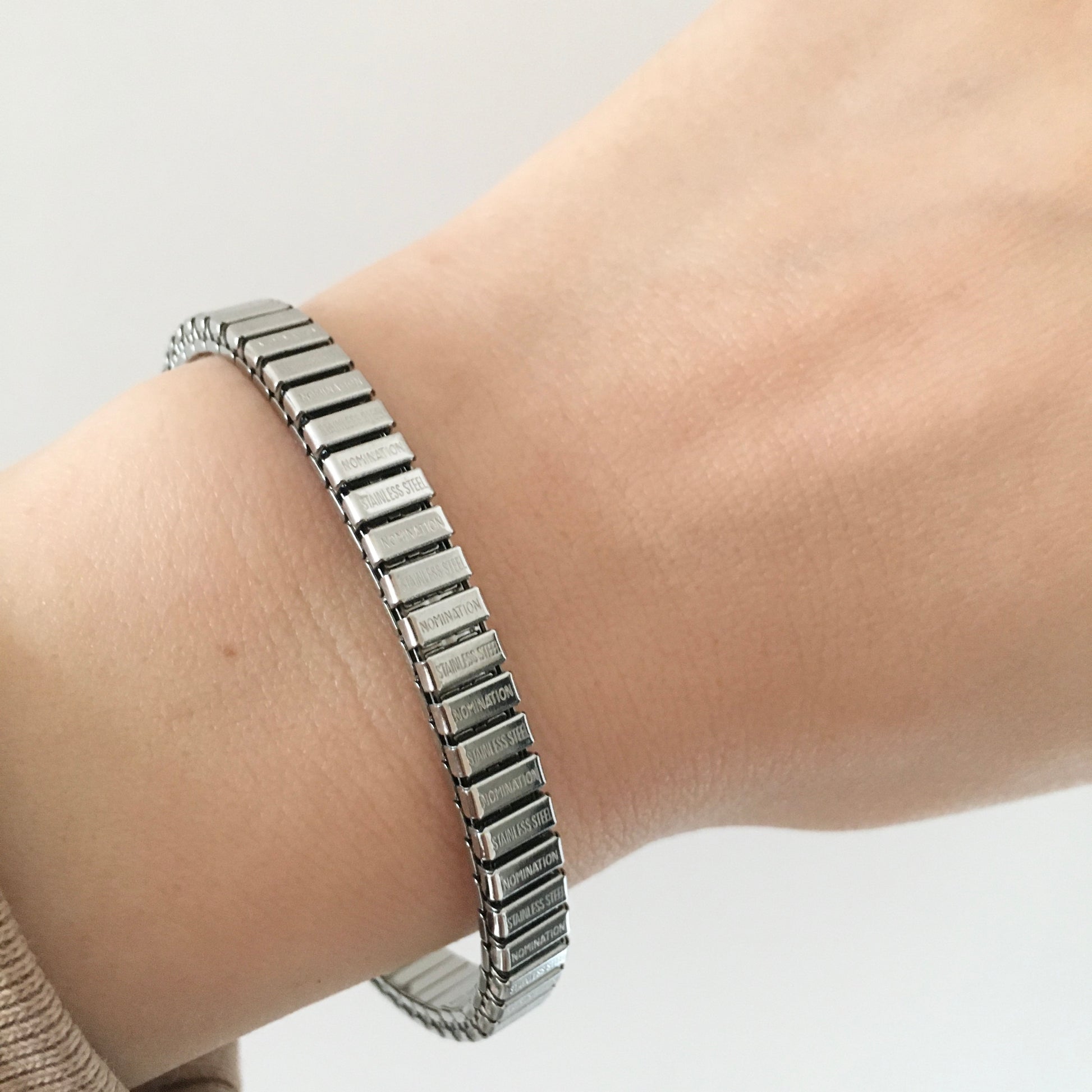 Pulsera Nomination Italy con circonita púrpura y detalles de ámbar y perla
